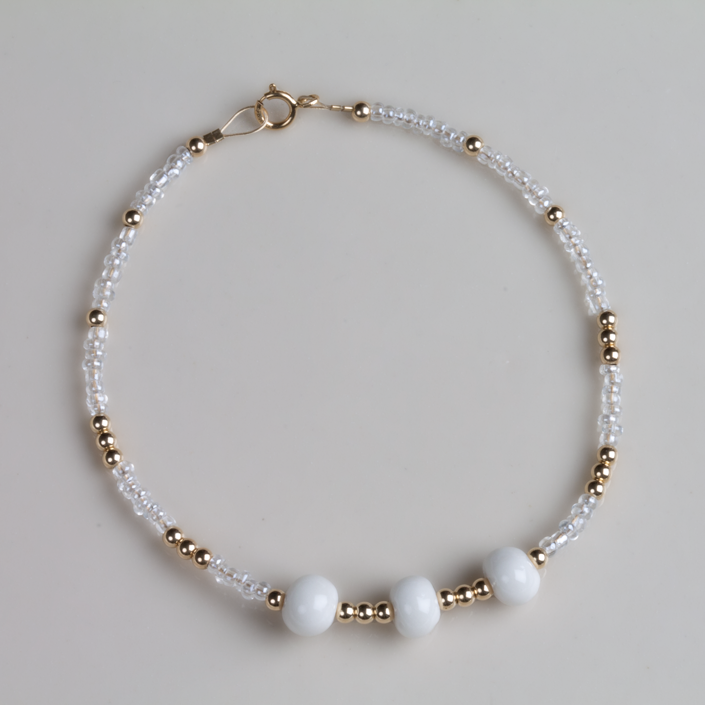 Porcelain and gold bead bracelet